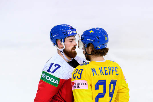 Filip Hronek of Czech Republic and Mario Kempe of Sweden