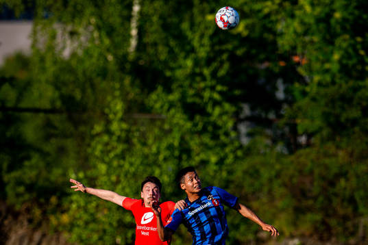 Vegard Forren of Brann and Kosuke Kinoshita of Stabæk