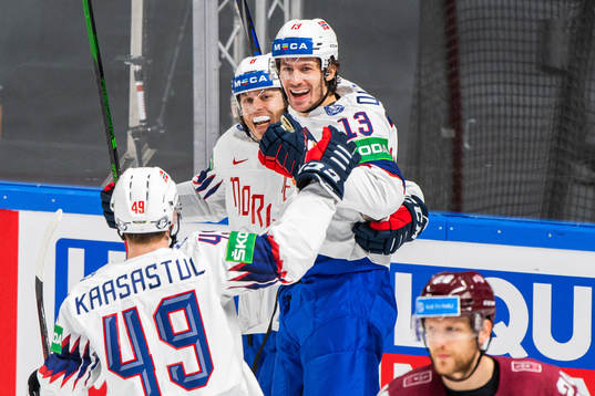 Sondre Olden of Norway celebrates with team mates after scoring 0-1