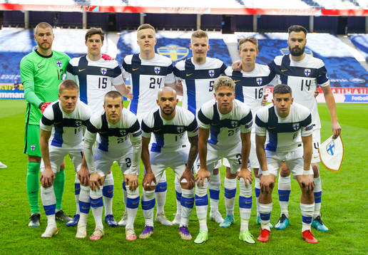 In this handout photo from the The Football Association of Finland goalkeeper Jesse Joronen, Sauli Väisänen, Robert Ivanov, Juhani Ojala, Lassi Lappalainen, Tim Sparv, Jere Uronen, Roope Riski, Nikolai Alho, Onni Valakari, and Jasin Assehnoun line up for a team photo prior to the international friendly football match between Sweden and Finland