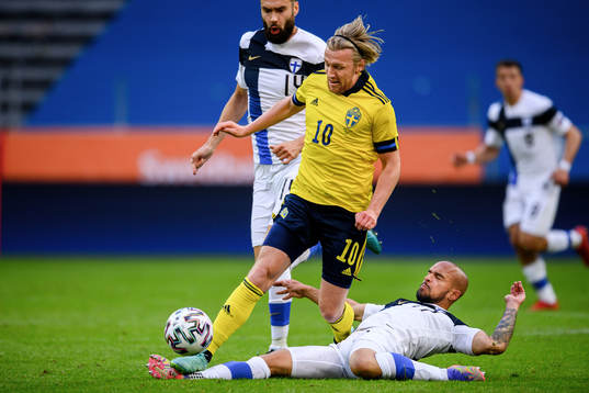 Emil Forsberg of Sweden and Nikolai Alho of Finland