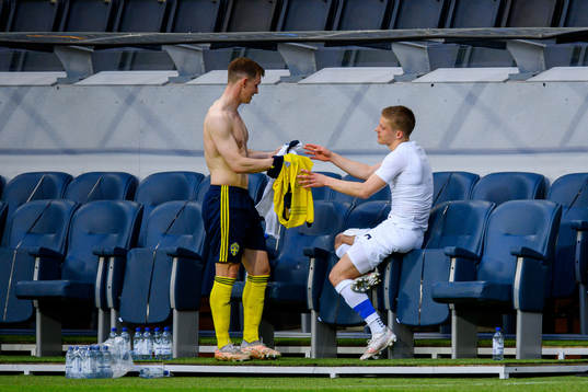 Emil Krafth of Sweden and Jere Uronen of Finland