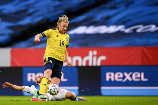 Emil Forsberg of Sweden and Nikolai Alho of Finland
