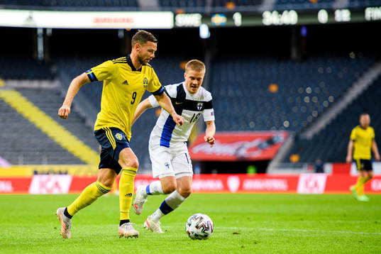 Marcus Berg of Sweden and Jere Uronen of Finland