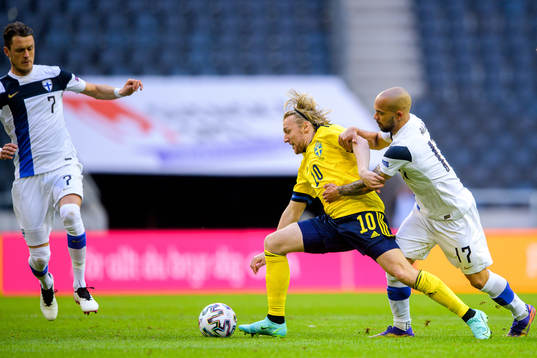 Emil Forsberg of Sweden and Nikolai Alho of Finland