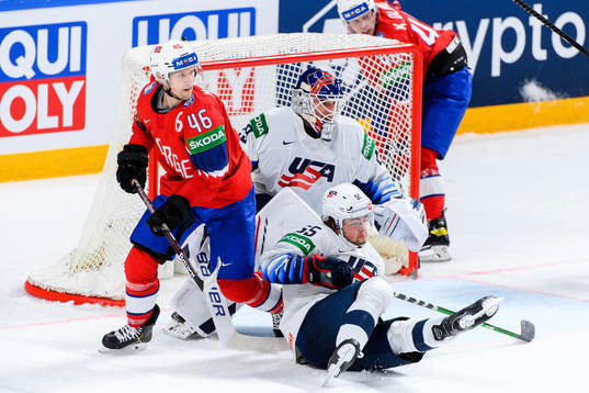 Mathis Olimb of Norway against goalkeeper Jake Oettinger