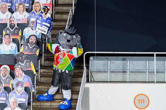 The mascot with a Cut-out photograph of a fan