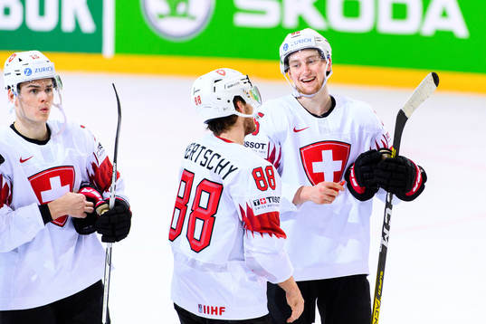 Christoph Bertschy and Janis Moser of Switzerland celebrate
