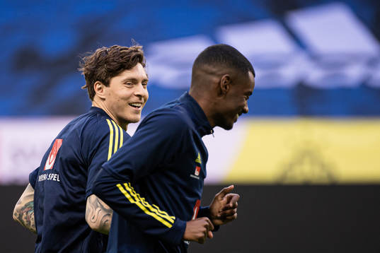Victor Nilsson Lindelöf and Alexander Isak of the Swedish