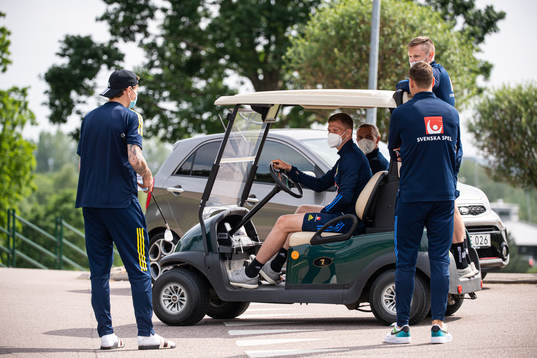 Mattias Johansson, Niklas Hult and Joakim Nilsson of the Swedish national football team's reserve squad talking to Victor Nilsson Lindelöf and Viktor Claesson ahead of a training session