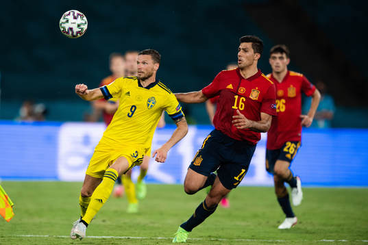 Marcus Berg of Sweden and Rodri Rodri of Spain