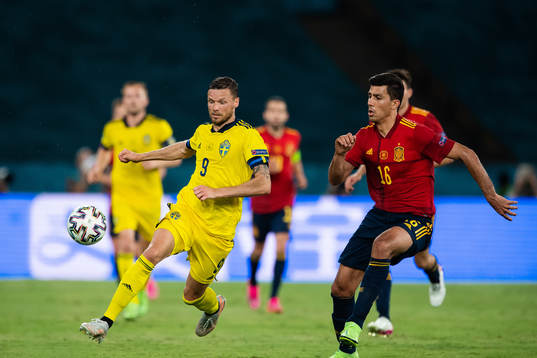 Marcus Berg of Sweden and Rodri Rodri of Spain
