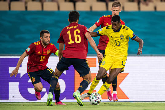 Jordi Alba, Rodri and Dani Olmo of Spain are challenged by