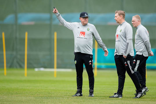 Head coach Janne Andersson and assistant coach Peter Wettergren  of the Swedish national football team at a training session