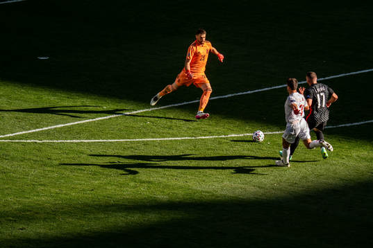 Goalkeeper Unai Simon and Cesar Azpilicueta and Ante Rebic