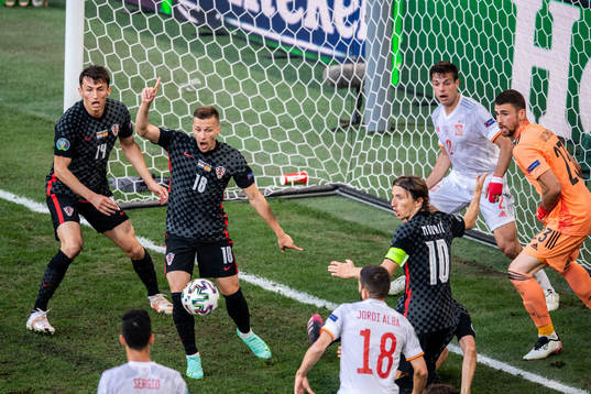 Ante Budimir, Misalv Orsic and Luka Modric of Croatia celebrates 2-3