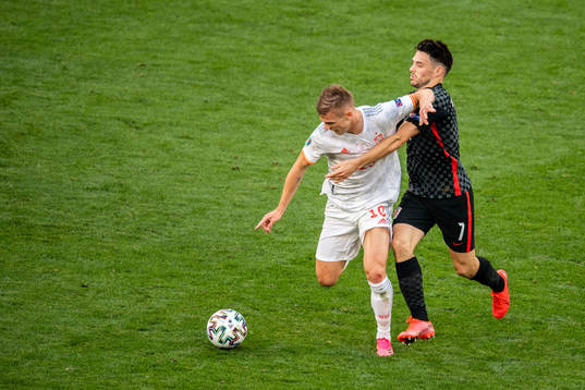 Thiago Alcantara of Spain and Josip Brekalo of Croatia