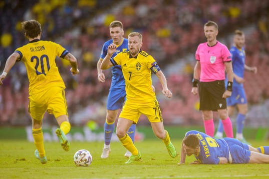 Kristoffer Olsson and Sebastian Larsson of Sweden against Roman Yaremchuk of Ukraine
