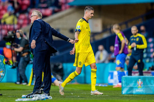 head coach Janne Andersson and Mikael Lustig of Sweden