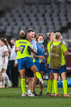 Peter Gerhardsson, head coach celebrate with Madelen Janogy of Sweden