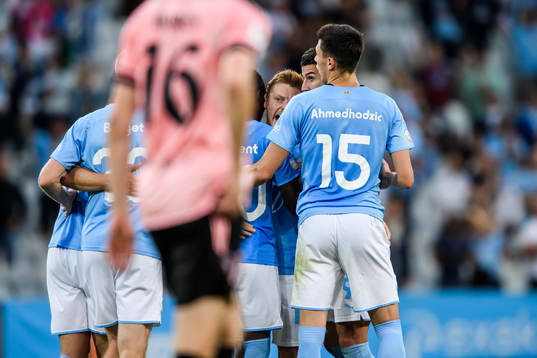 Anders Christiansen of Malmö FF celebrate with teammates