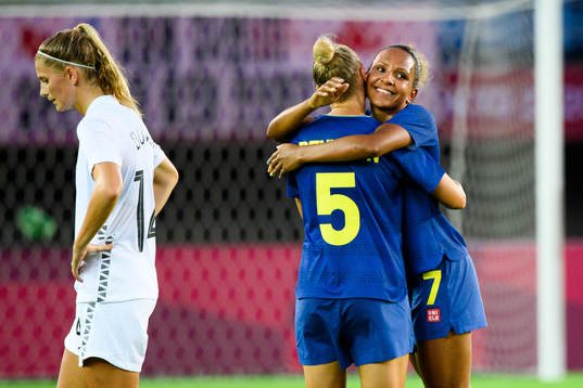 Hanna Bennison and Madelen Janogy of Sweden celebrate after the women’s football match between New Zealand and Sweden