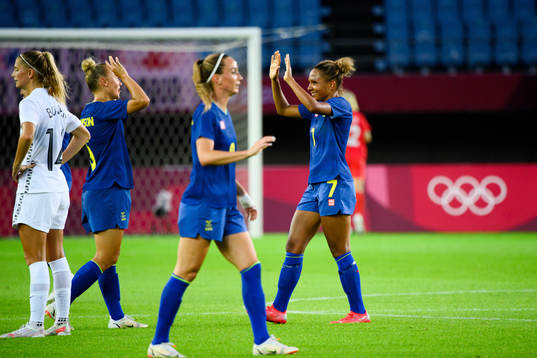 Hanna Bennison and Madelen Janogy of Sweden celebrate after the women’s football match between New Zealand and Sweden