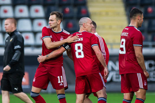 Ryan Hedges and Scott Brown of Aberdeen celebrate