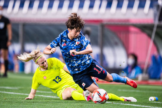 Amanda Ilestedt of Sweden and Mina Tanaka of Japan in the