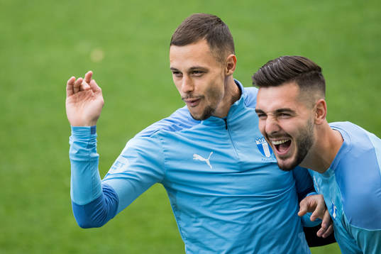 Veljko Birmancevic and goalkeeper Marko Johansson