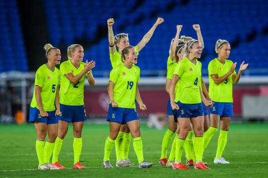 Players of Sweden celebrate