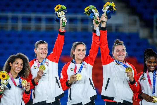 Christine Sinclair of Canada celebrates with her gold medal