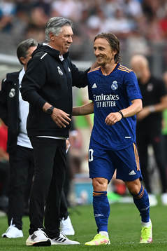  Carlo Ancelotti coach of Real Madrid and Luka Modric of Real Madrid during a friendly game between Real Madrid and Milan on August 8, 2021 in Klagenfurt.
