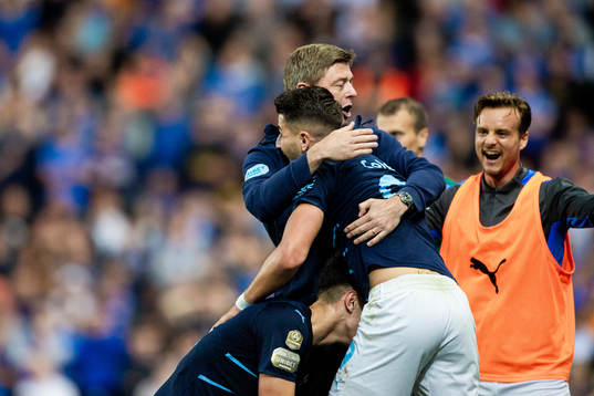 Anel Ahmedhodzic, Jon Dahl Tomasson, head coach Eric Larsson and Antonio Colak of Malmö FF celebrate the 1-2 goal during the UEFA Champions League qualifying match between Rangers and Malmö FF on August 10, 2021 in Glasgow. 
