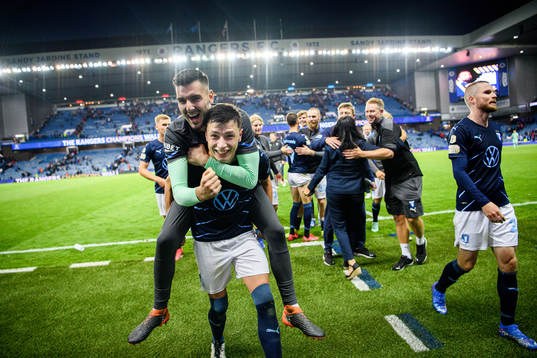 Goalkeeper Marko Johansson and Anel Ahmedhodzic of Malmö FF celebrate