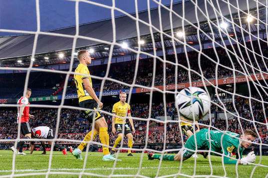 Luis Sinisterra off Feyenoord scores behind goalkeeper Tim