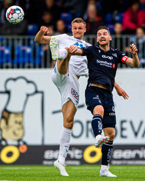 Stian Rode Gregersen of Molde and Bendik Bye of Kristiansund