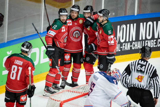 Mats Rosseli Olsen celebrates scoring 1-1 with team mates