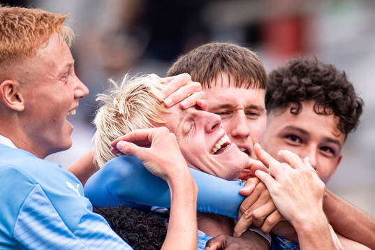 Emil Lindman of Malmö FF celebrate with teammates after the 2-2 goal
