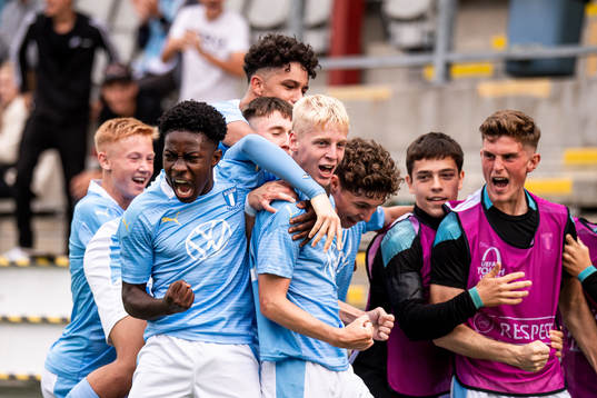 Emil Lindman of Malmö FF celebrate with teammates after the 2-2 goal