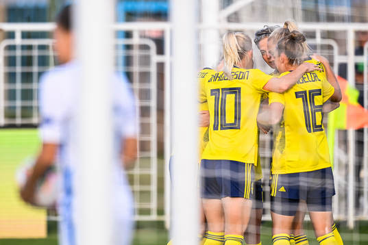 Sofia Jakobsson, Lina Hurtig and Filippa Angeldahl celebrate with Fridolina Rolfö of Sweden after she scored 0-1