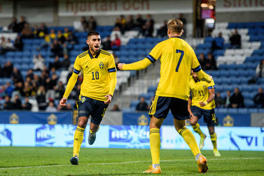 Rami Hajal and Benjamin Nygren of Sweden celebrate the 1-0 goal