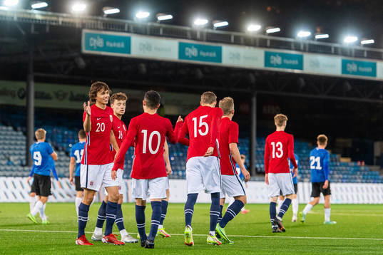 Osame Sahraoui and Halldor Stenevik celebrate with Martin
