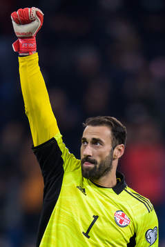Goalkeeper Giorgi Loria of Georgia celebrates