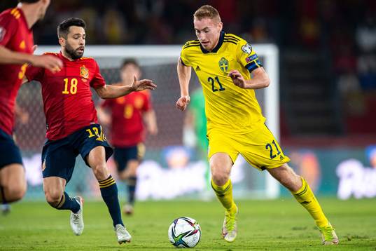 Jordi Alba of Spain and Dejan Kulusevski of Sweden