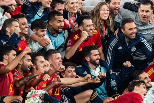 Players of Spain celebrate