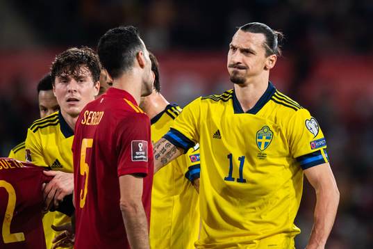 Sergio Busquets of Spain and Zlatan Ibrahimovic of Sweden