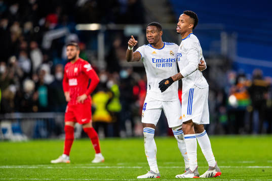 David Alaba and Eder Militao of Real Madrid celebrate