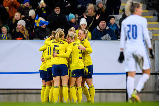 Players of Sweden celebrate the 1-0 goal by Lina Hurtig