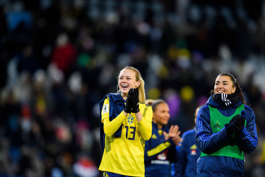 Amanda Ilestedt and goalkeeper Zecira Musovic of Sweden celebrate